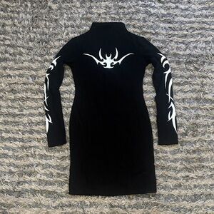 Elegant Black Dress with White Tribal Accents
